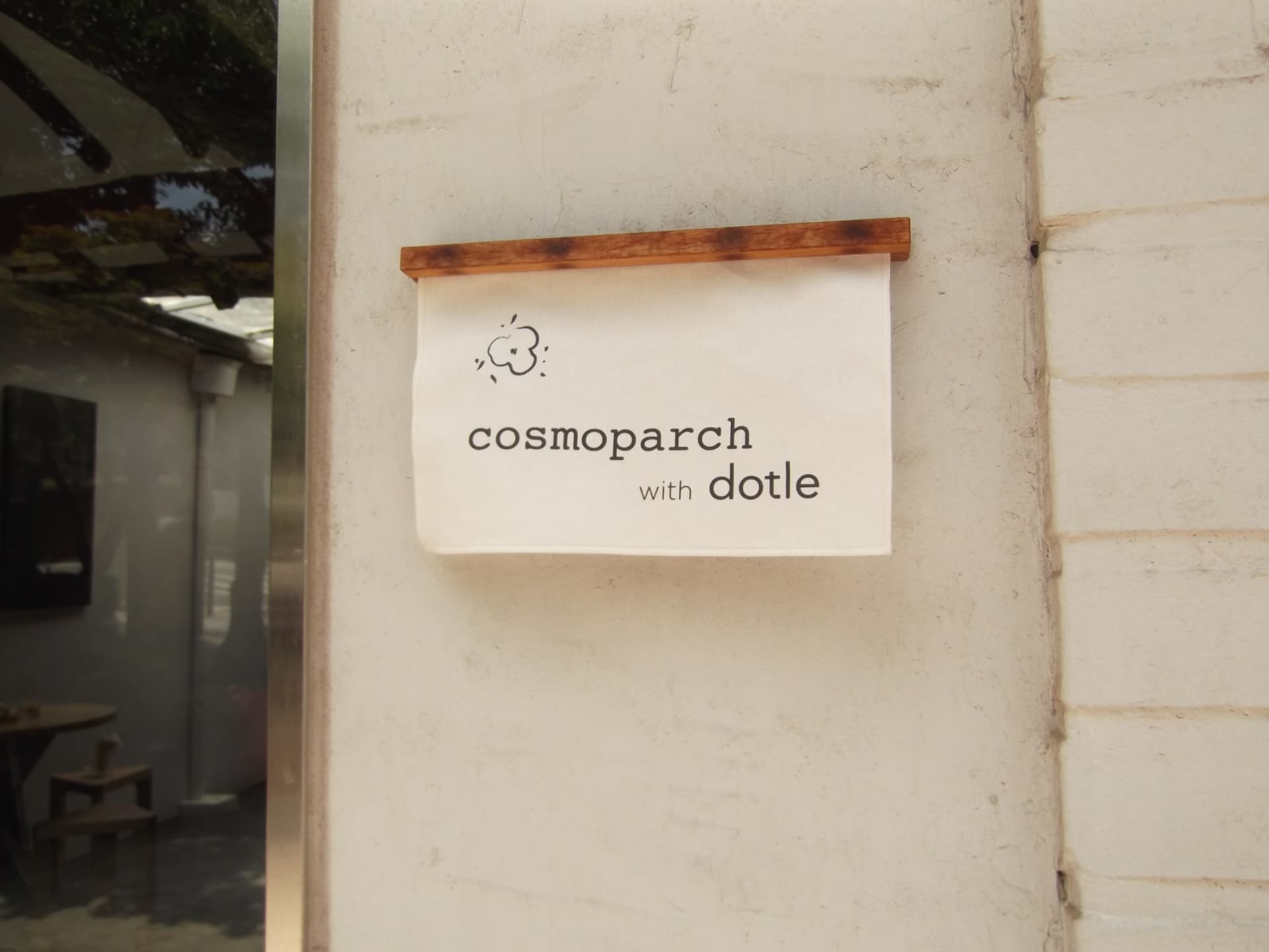 Signage, cosmoparch with dotle